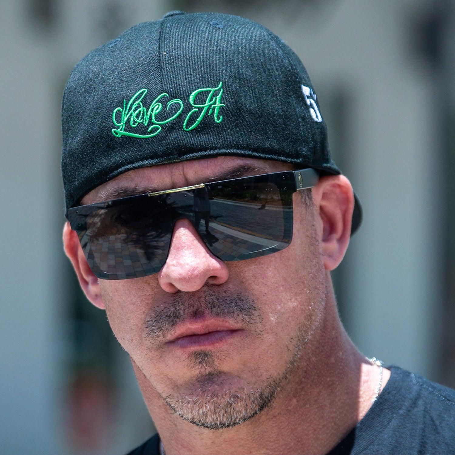 Love It Kill It, Black Hat with Green Lettering